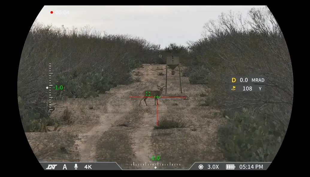 DNT Optics ZULUS 4K on-screen display showing a 108-yard rangefinder reading and 0.0 MRAD holdover on a real deer